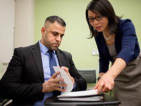 Instructor helping a student