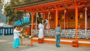 Image of people at a tea house during a ceremony. Taken by Ice Tea